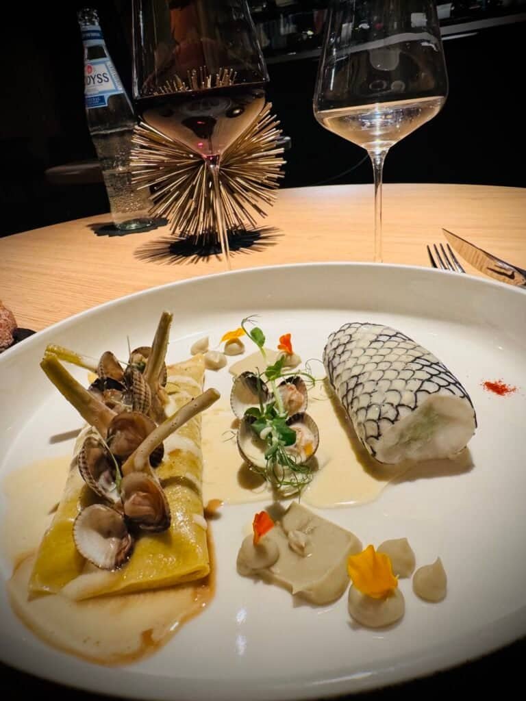 Beautifully presented fish course at Clairefontaine Luxembourg City fine dining
