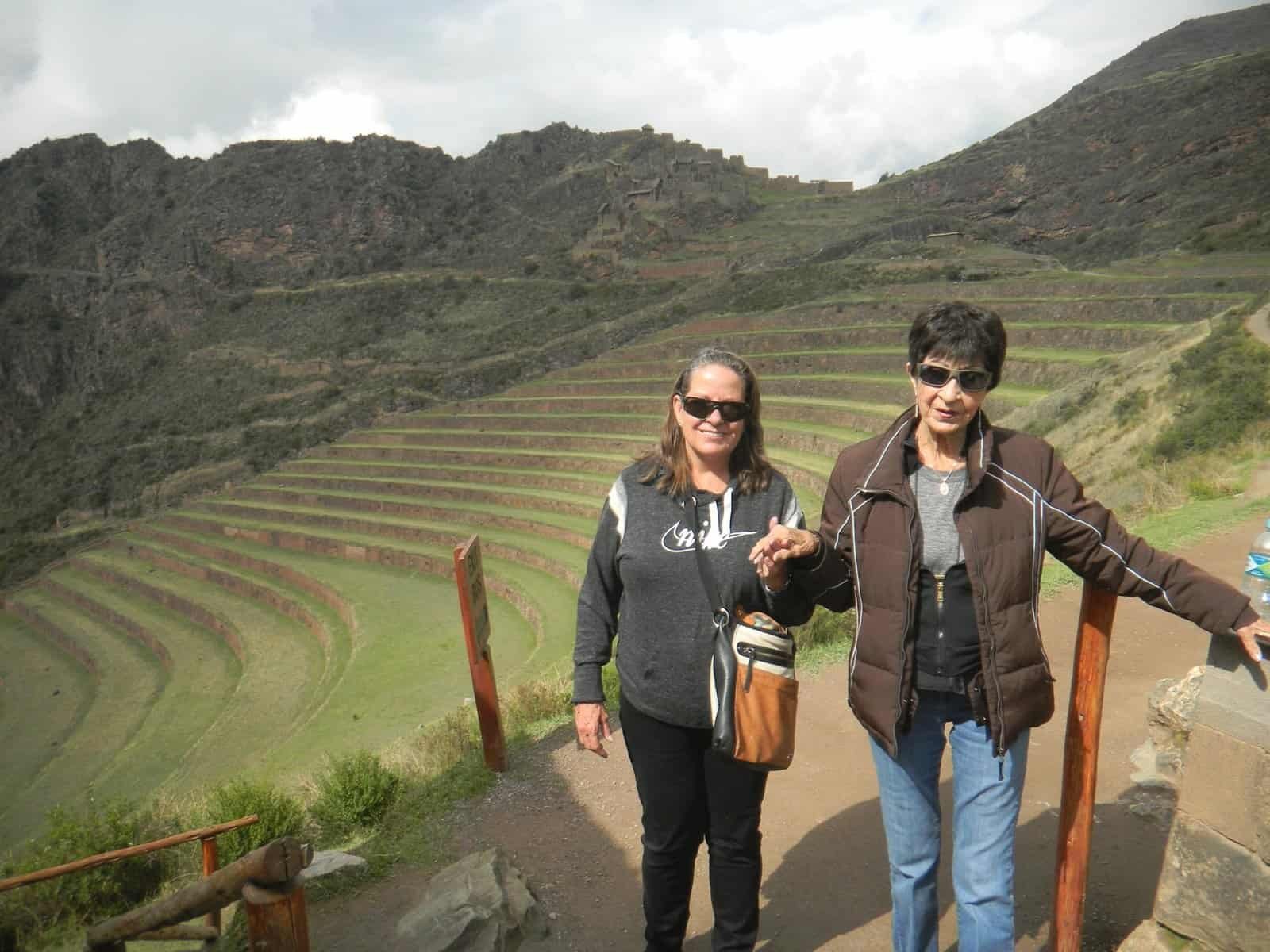 Memaw in Peru’s Sacred Valley in 2018, at eighty-two, hand in hand with my aunt.